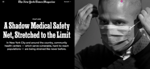 A New York Times Cover of Chief Nursing Officer Anthony Fortenberry adjusting his face mask.