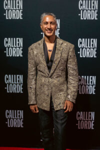 Actor Maulik Pancholy standing smiling at the Community Health Awards.